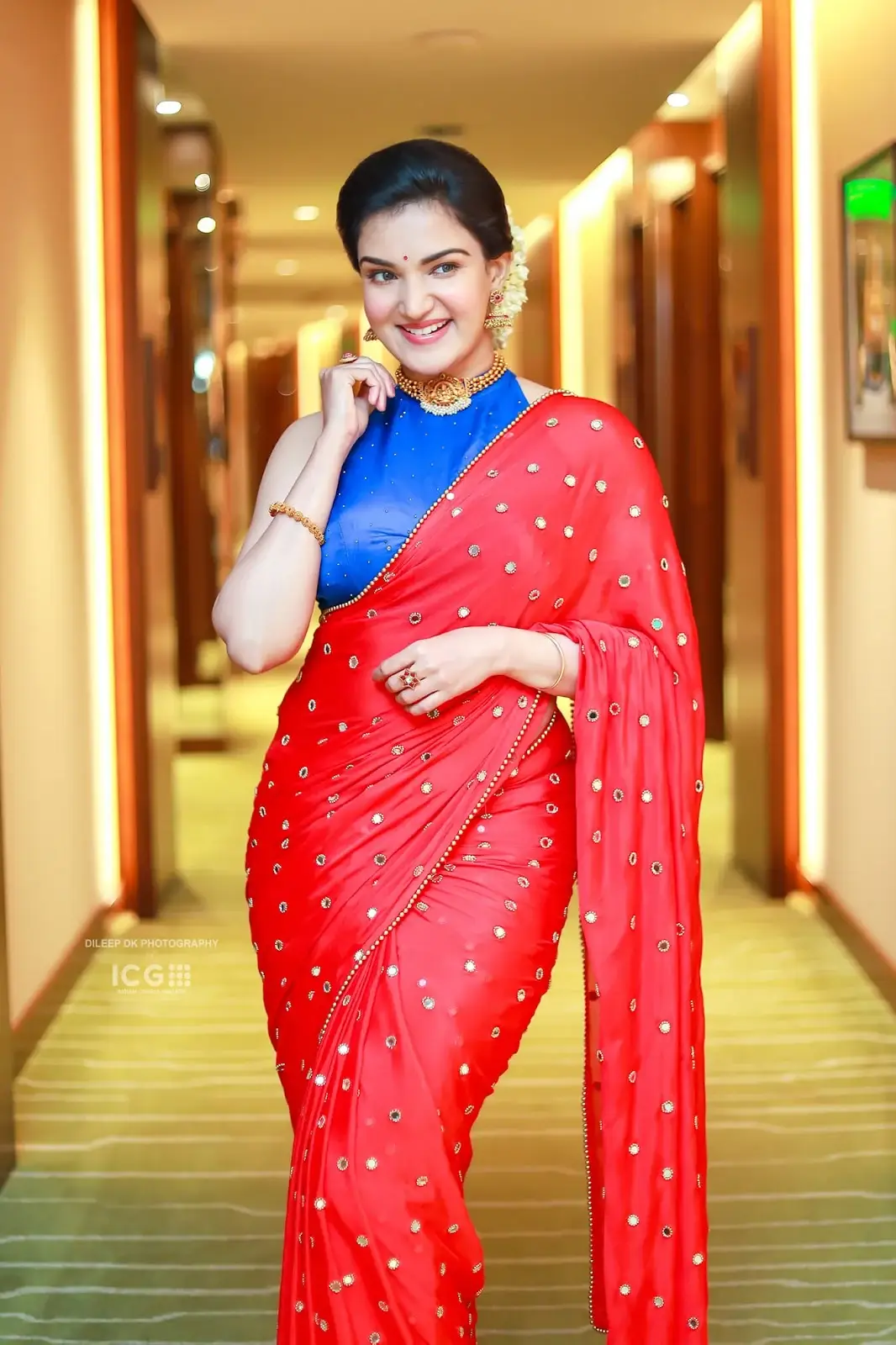 INDIAN ACTRESS HONEY ROSE IN SLEEVELESS RED SAREE 5